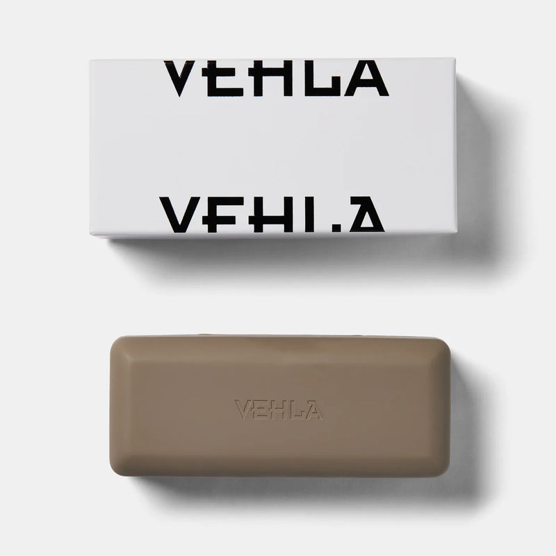 vehla eyeywear packaging white box with logo and taupe grey case