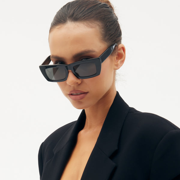 model wearing vehla eyewear florence sunglasses in black / smoke