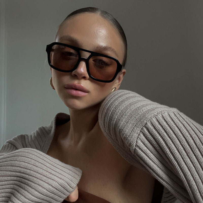 model wearing the dixie black toffee sunglasses from Vehla eyewear