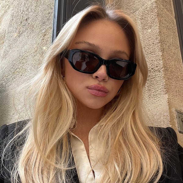 model wearing the felix sunglasses from vehla eyewear in black / choc