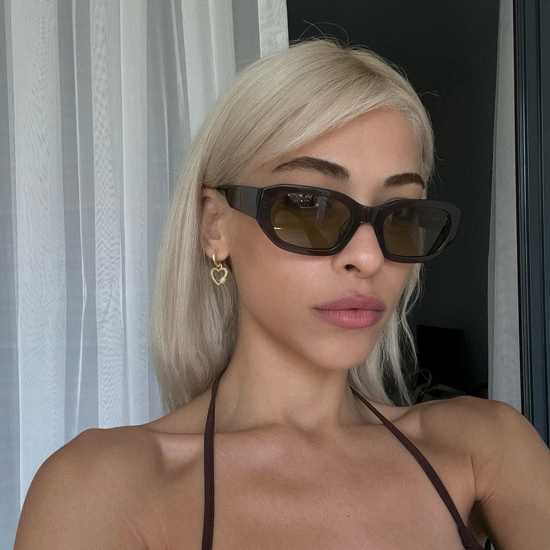 blonde model wearing felix coco khaki from vehla eyewear