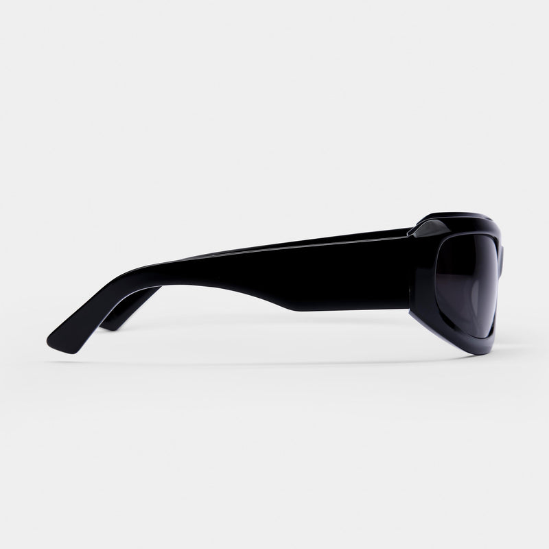 side shot of the gia black / Smoke sunglasses from vehla eyewear