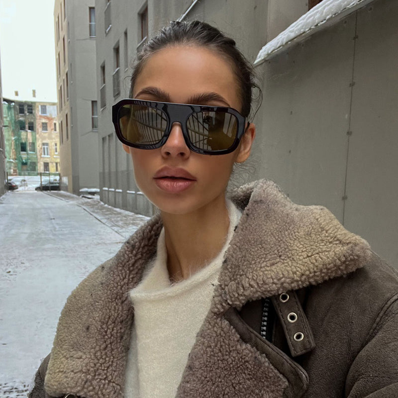 model wearing the kaia sunglasses from vehla eyewear in malbec / khaki