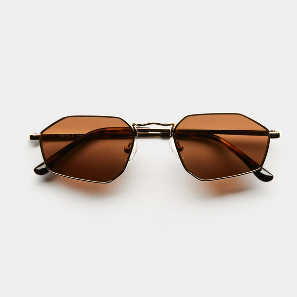 front image of vehla eyewear piper sunglasses in gold / choc