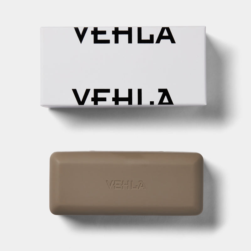 image of vehla packaging of grey hard case with logo and the white box it comes in